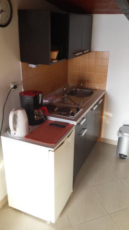 Apartments Riva Трогир Стая снимка